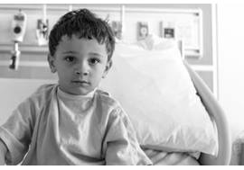 Young boy in hospital bed