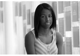 Teenage Girl Looking Somber in Hallway 