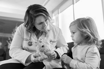 Doctor playing with patient